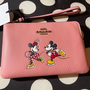 Coach x Disney Corner Zip Wristlet in Blush Pink. New with Tags! Mickey & Minnie